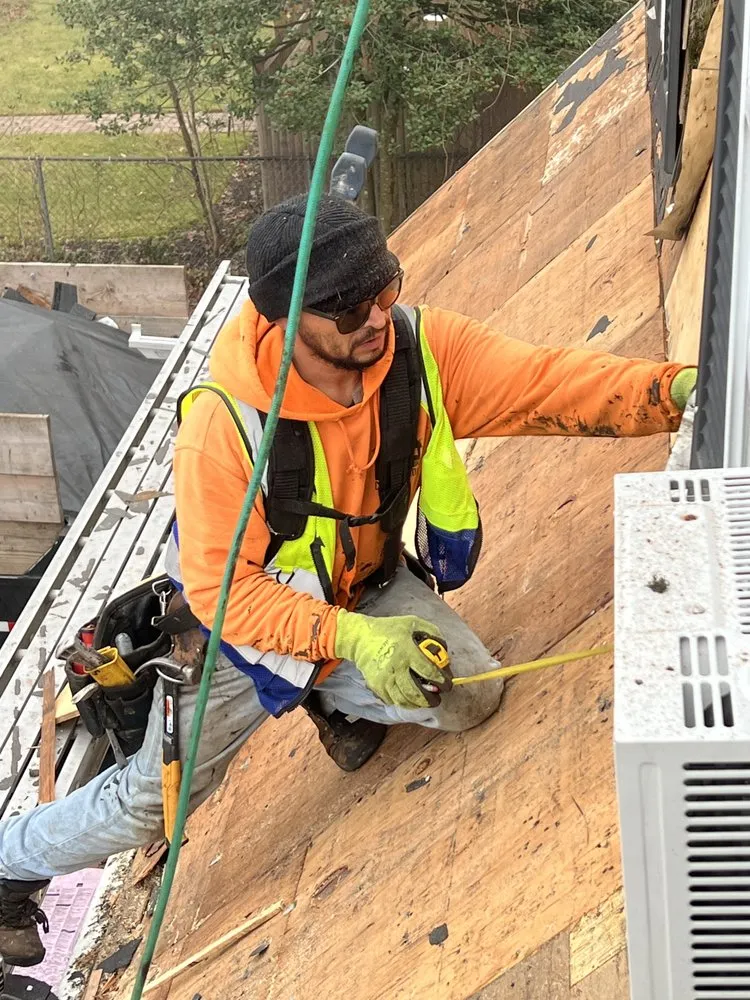 Slide of QB Roofing Solutions