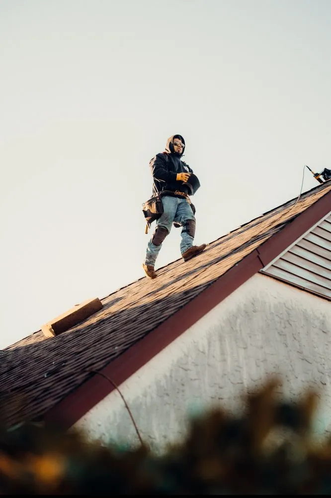 Slide of QB Roofing Solutions