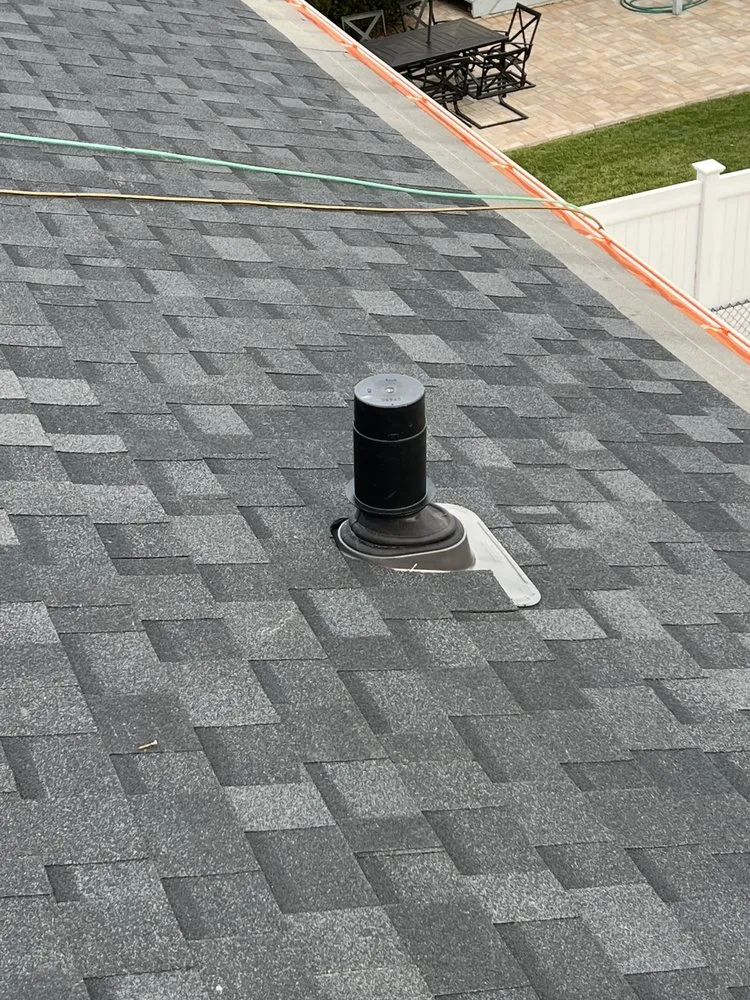 Slide of QB Roofing Solutions
