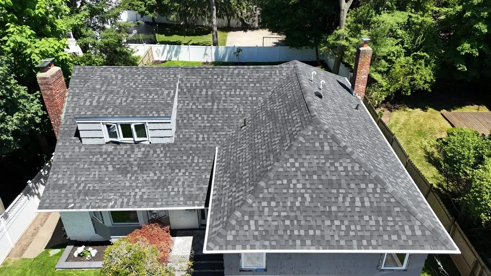 Slide of QB Roofing Solutions