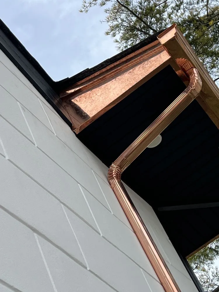 Slide of QB Roofing Solutions