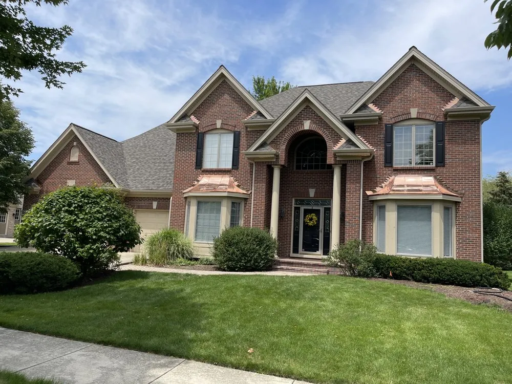 Slide of QCA Roofing