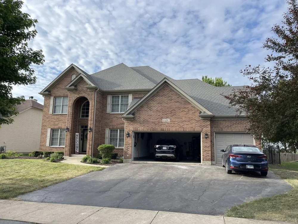 Slide of QCA Roofing