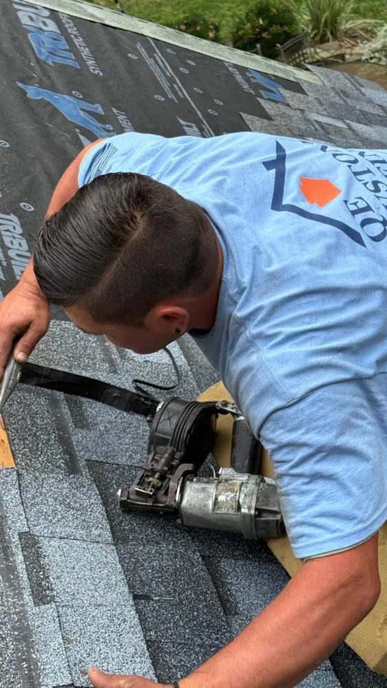 Slide of QE Keystone Roofing