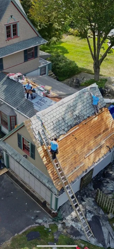 Slide of QE Keystone Roofing