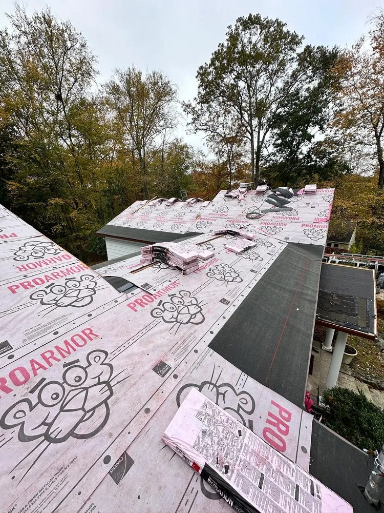 Slide of QE Keystone Roofing