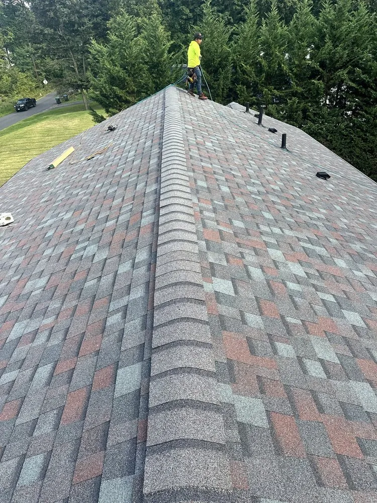 Slide of QE Keystone Roofing