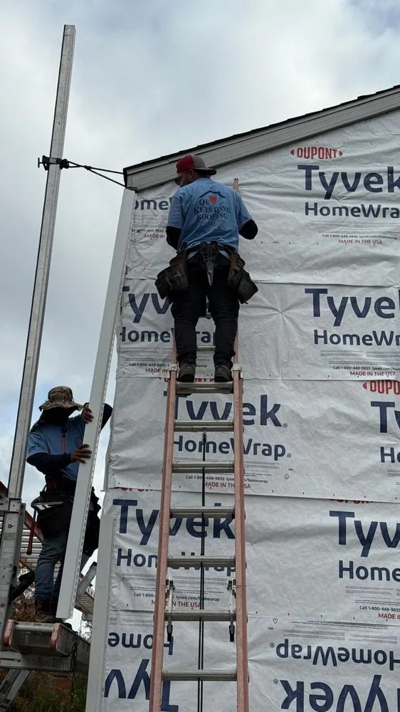 Slide of QE Keystone Roofing