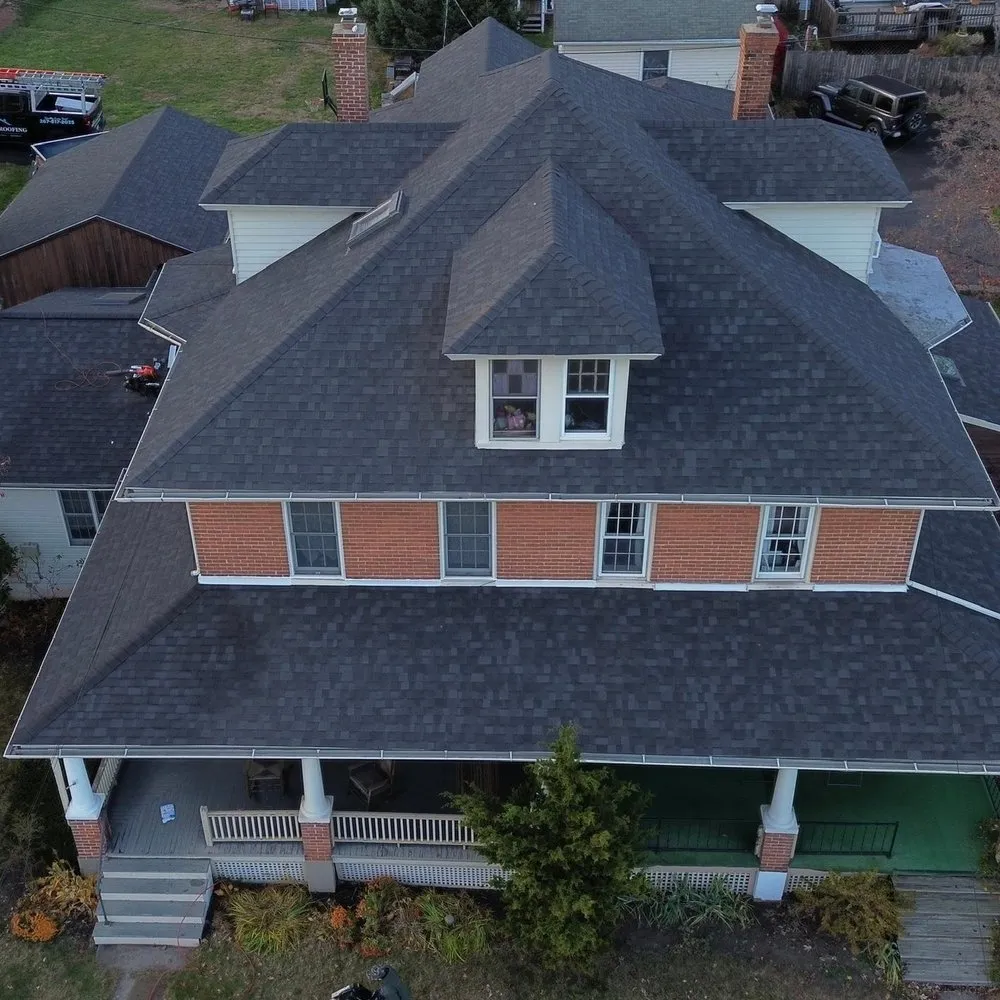 Slide of QE Keystone Roofing