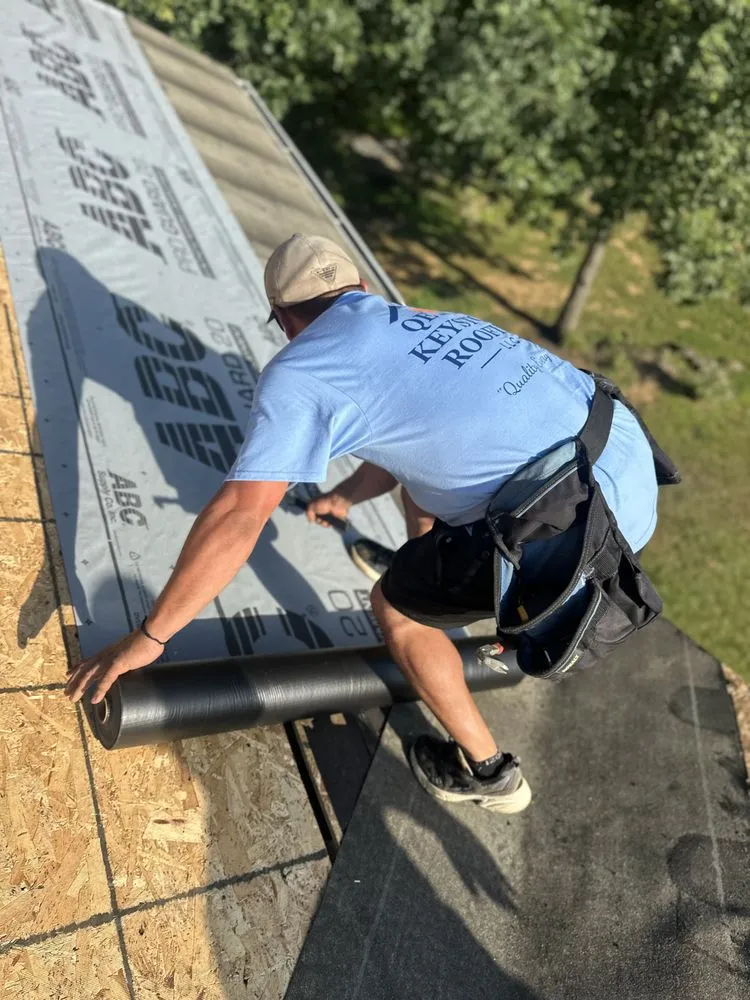 Slide of QE Keystone Roofing