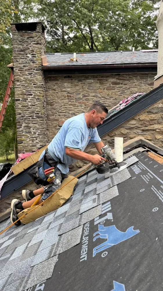 Slide of QE Keystone Roofing