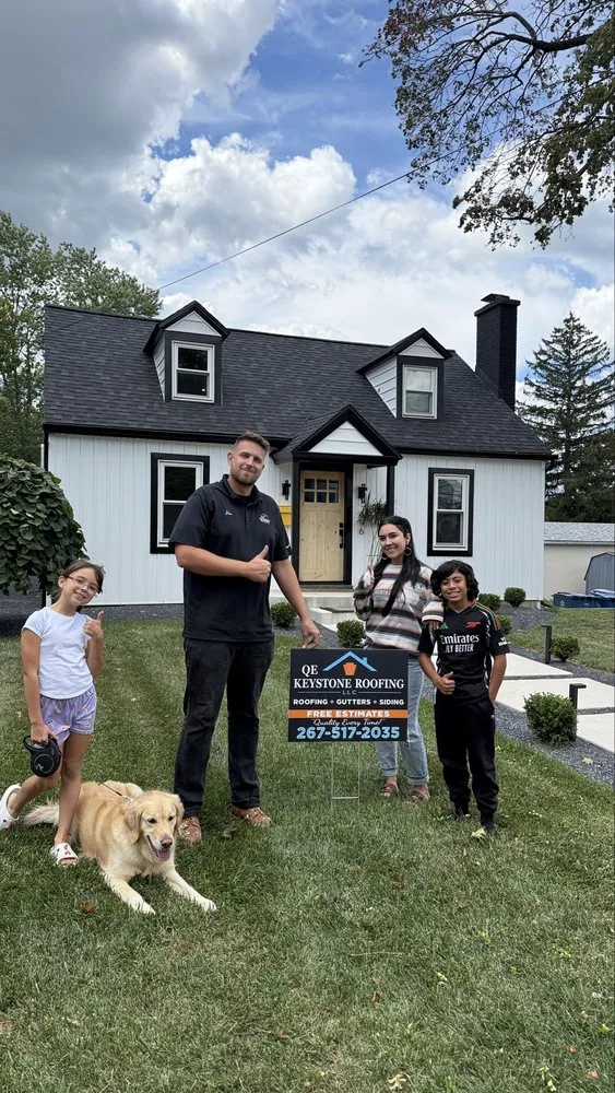 Slide of QE Keystone Roofing