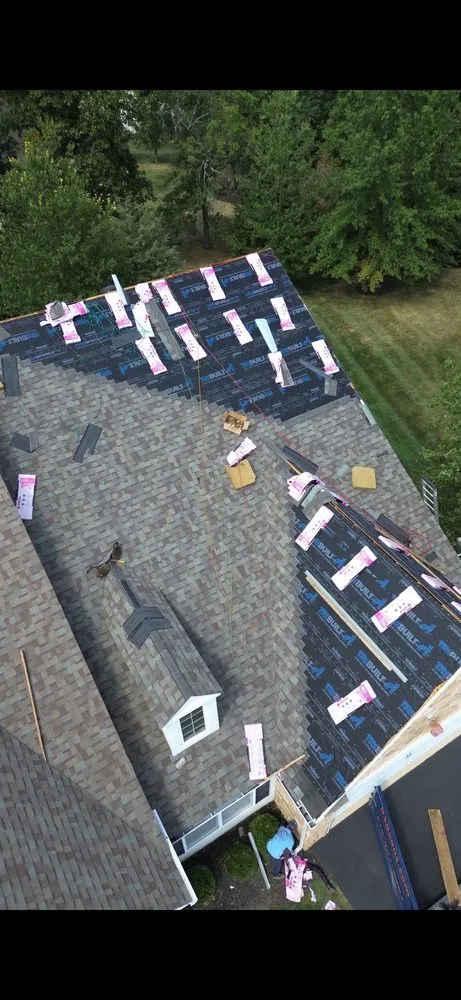 Slide of QE Keystone Roofing