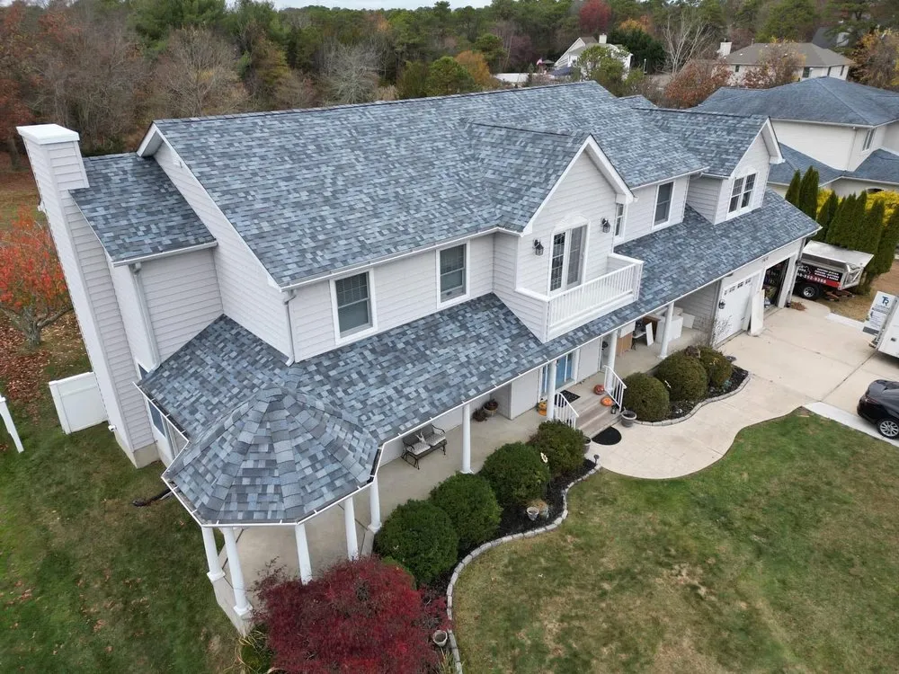 Slide of QE Keystone Roofing