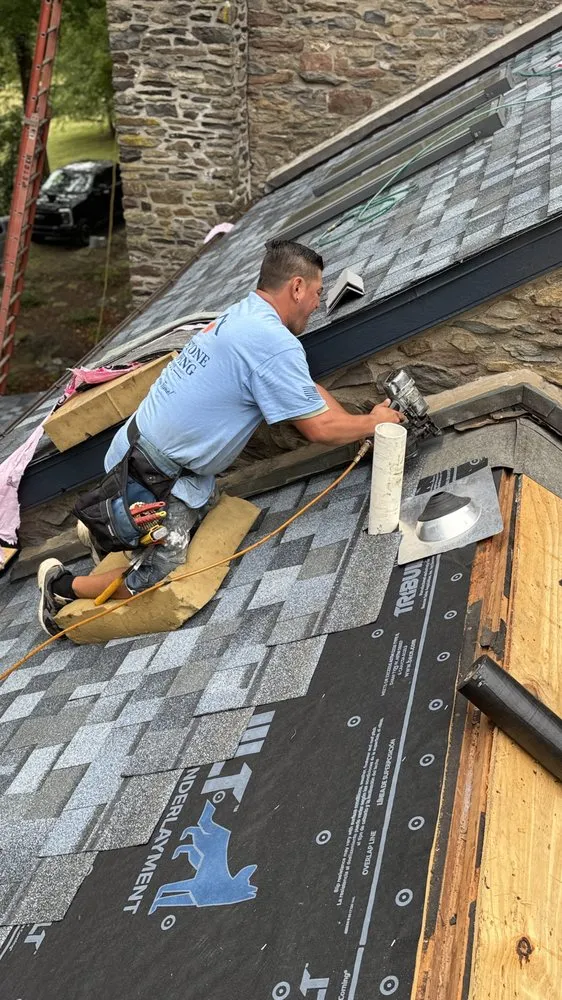 Slide of QE Keystone Roofing