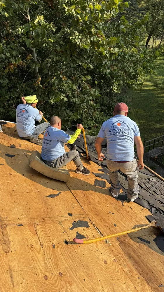 Slide of QE Keystone Roofing