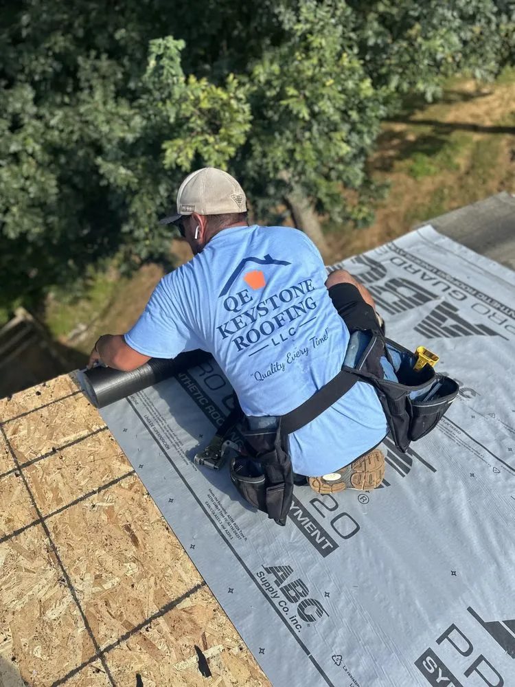 Slide of QE Keystone Roofing