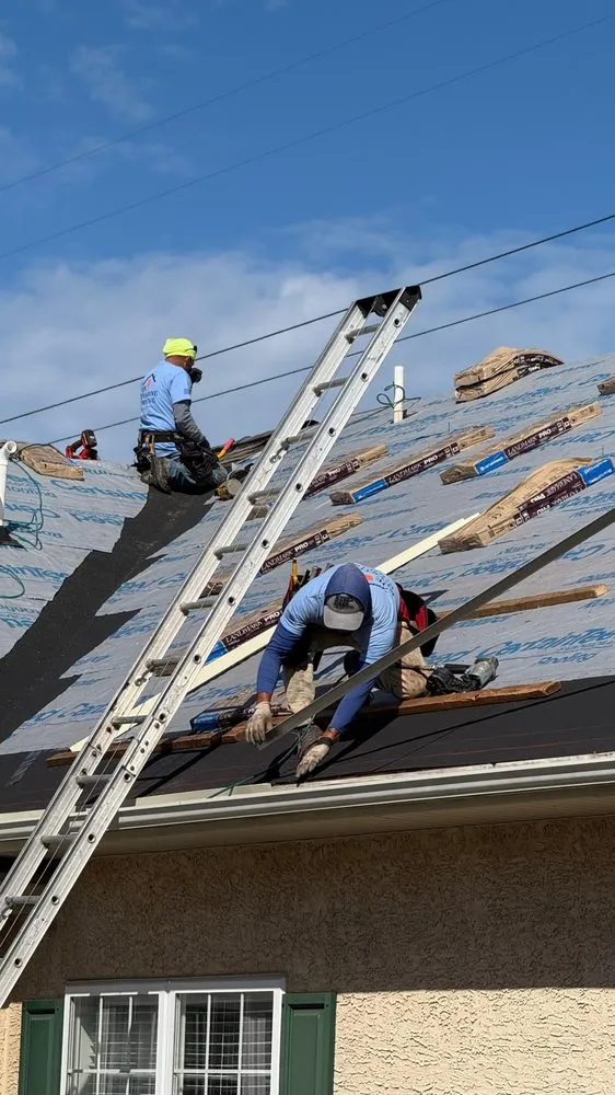 Slide of QE Keystone Roofing