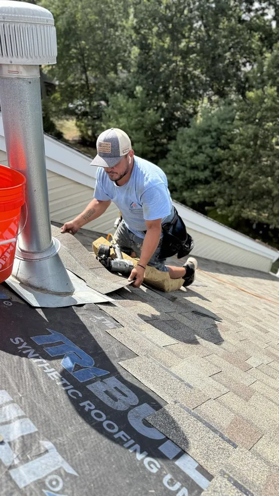 Slide of QE Keystone Roofing