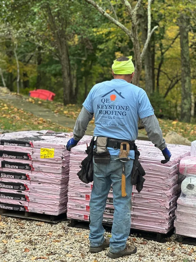 Slide of QE Keystone Roofing