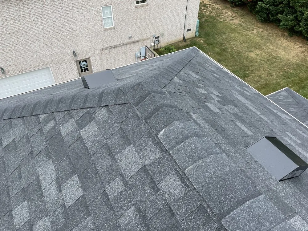 Slide of QE Roofing - Franklin