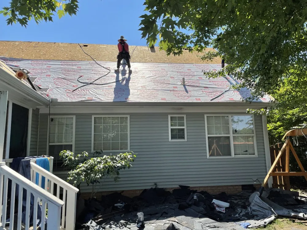 Slide of QE Roofing - Franklin