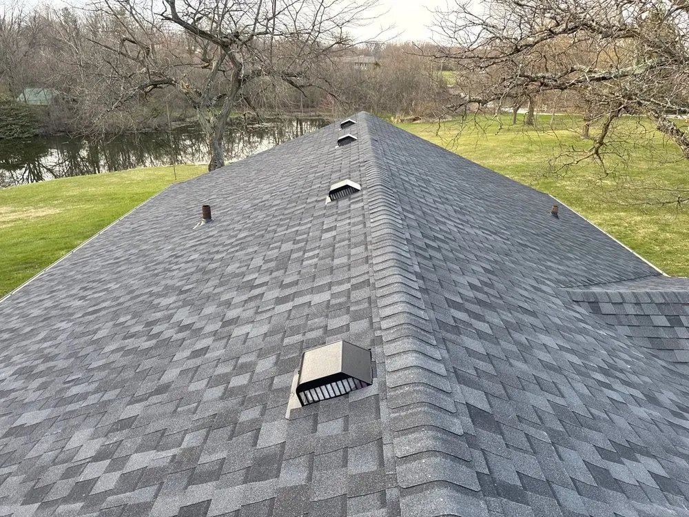 Emergency roof installation in Wheatfield, IN by Quad County Roofing