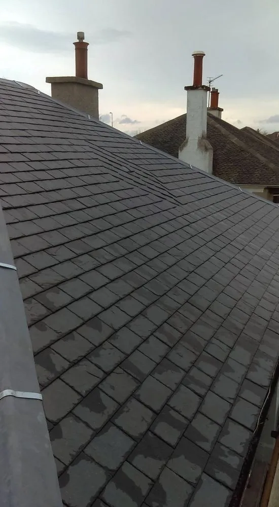 Slide of Quail Hill Roofing