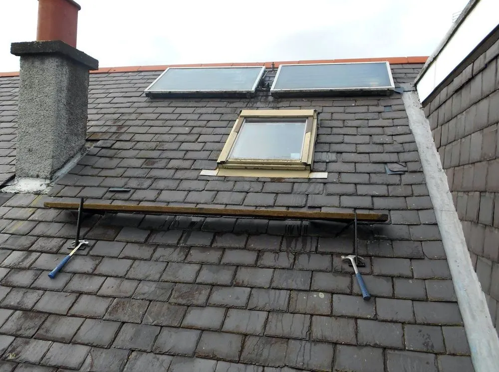 Slide of Quail Hill Roofing