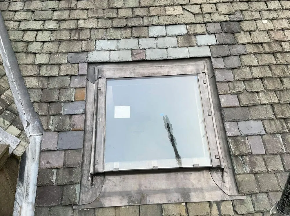 Slide of Quail Hill Roofing