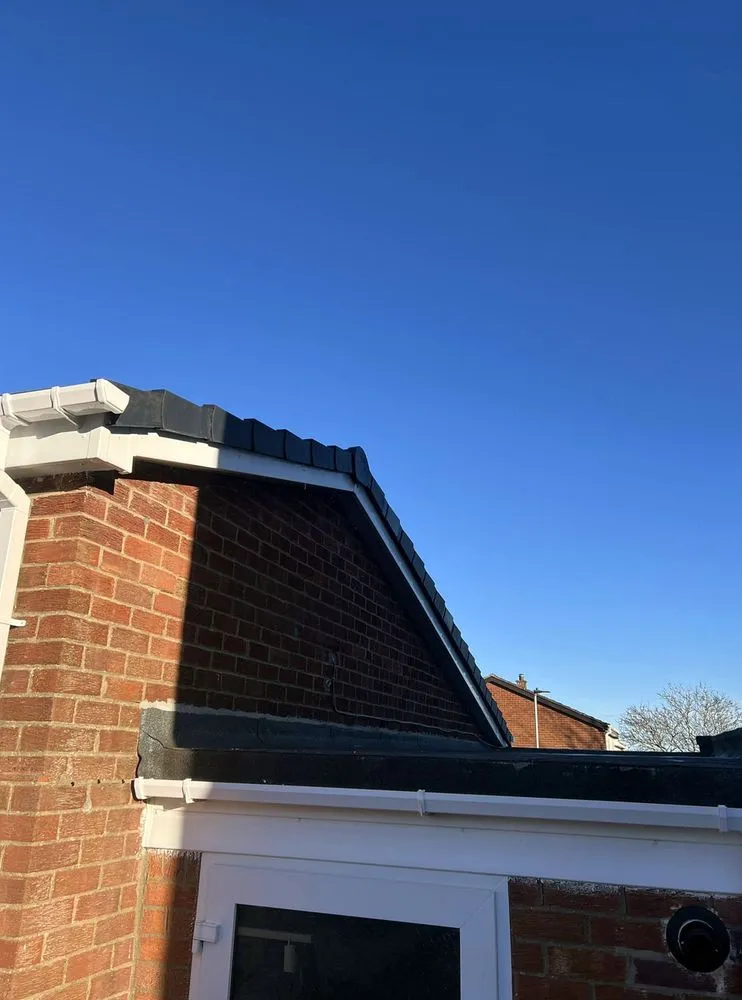 Slide of Quail Hill Roofing