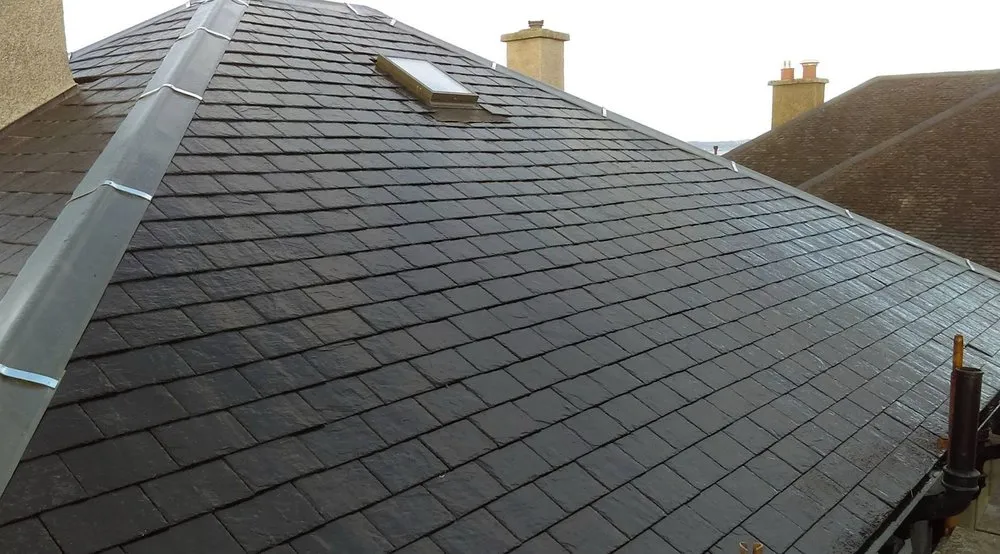 Slide of Quail Hill Roofing