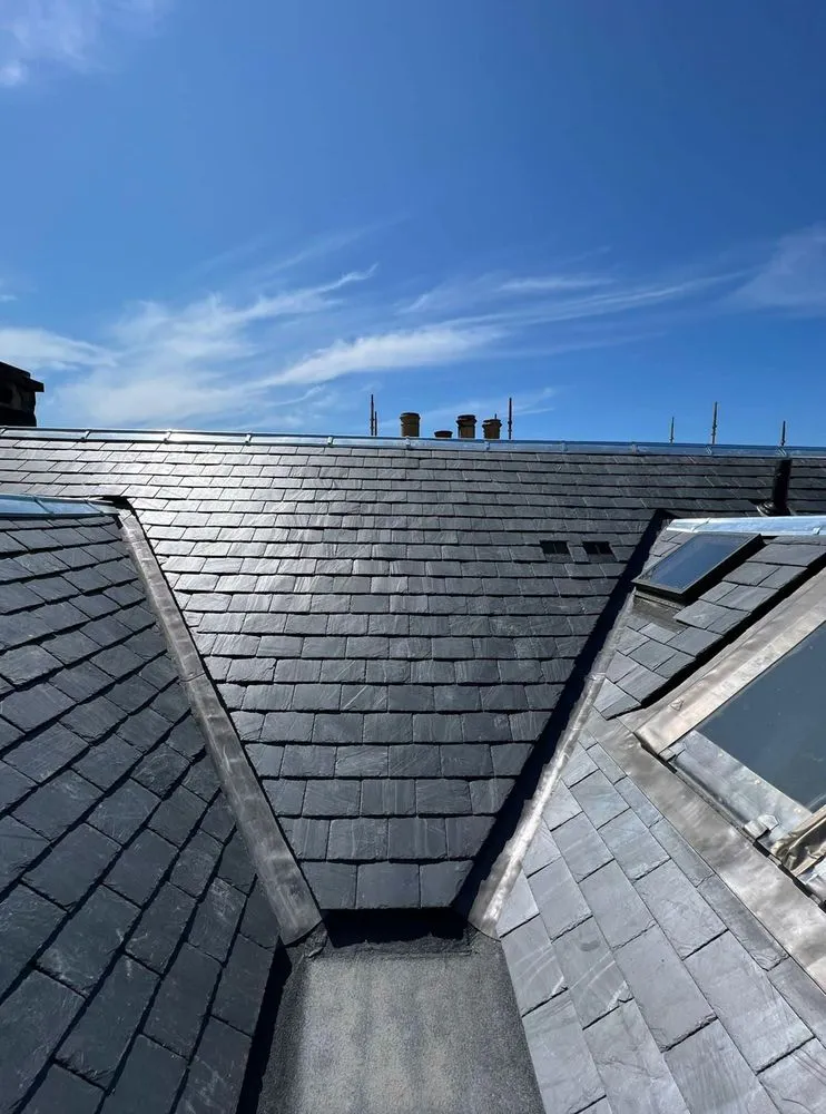 Slide of Quail Hill Roofing