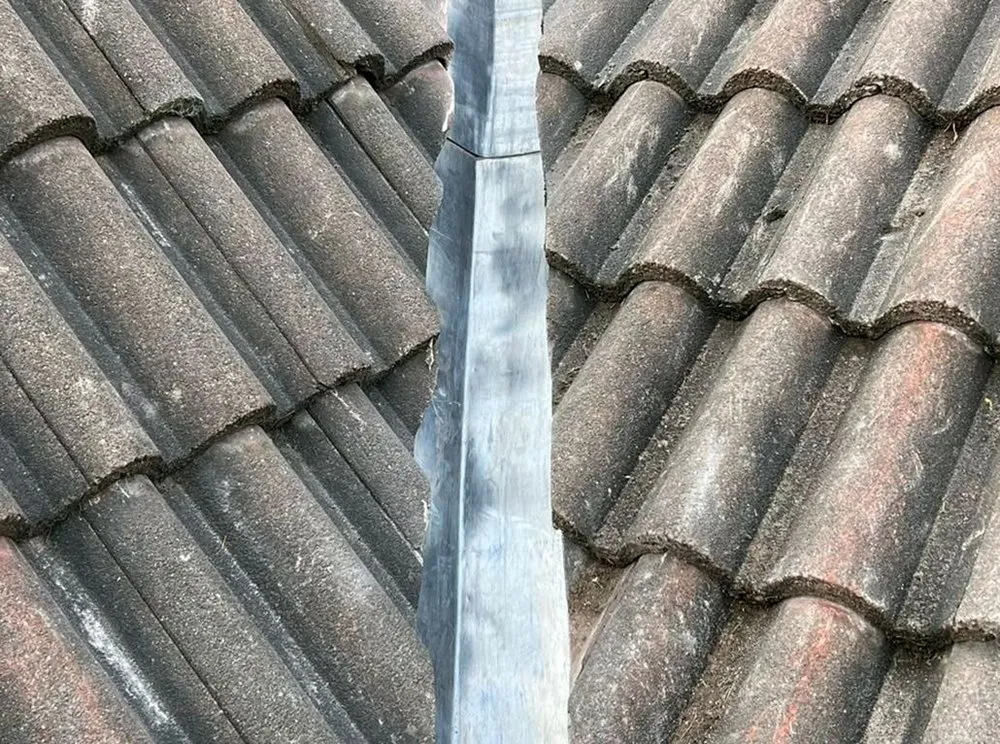 Slide of Quail Hill Roofing