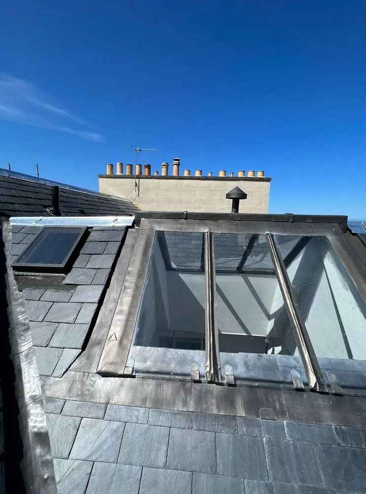 Slide of Quail Hill Roofing