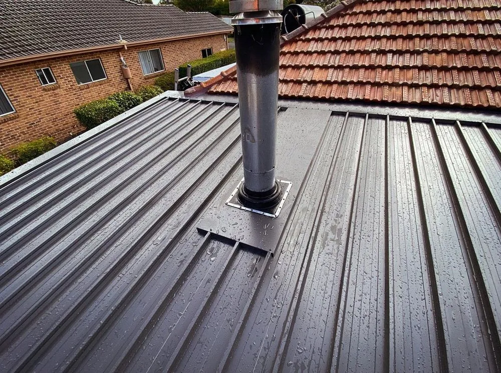 Slide of Quail Hill Roofing