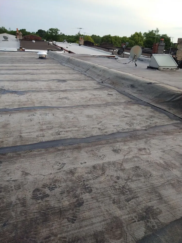 Slide of Qualified Roofing