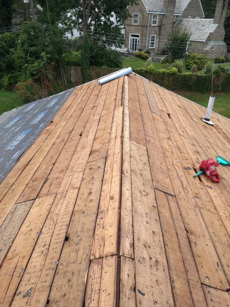 Slide of Qualified Roofing