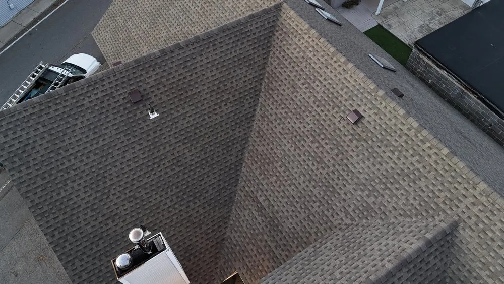 Slide of Qualified Roofing