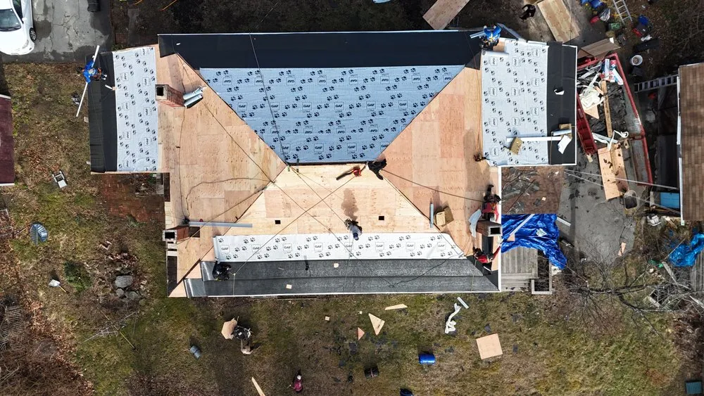 Slide of Qualified Roofing