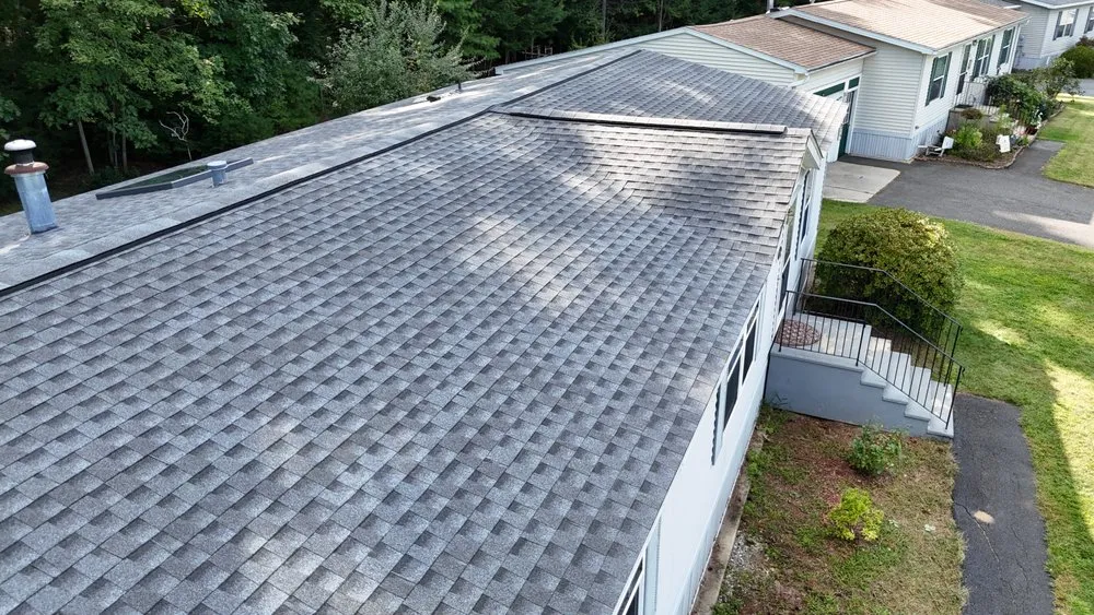 Slide of Qualified Roofing