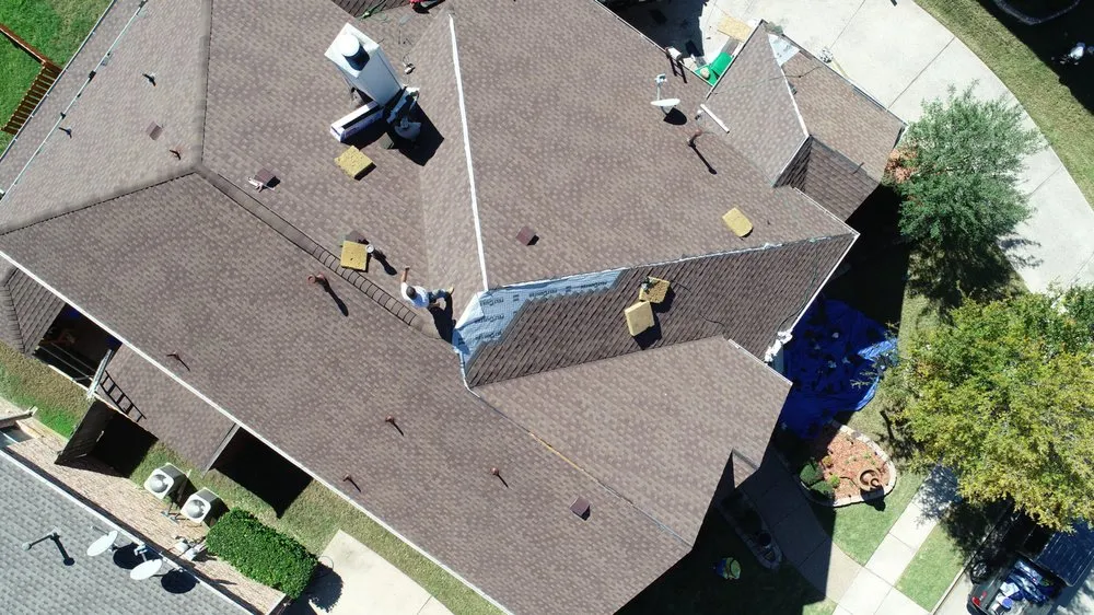 Slide of Qualitas Roofing and Construction