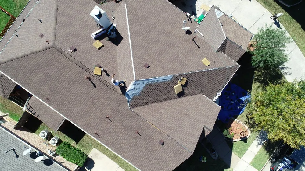 Slide of Qualitas Roofing and Construction