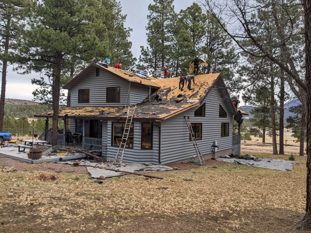 Top-rated roof leak repair after storm damage in Pinetop, AZ by Quality 1st Custom Builders