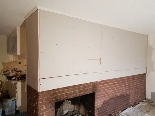 Quality Construction & Restoration Logo