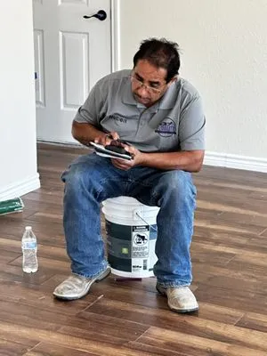 Quality Home Improvement Experts Logo