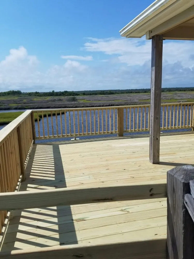 Professional storm damage roof repair in Stella, NC by Quality Home Improvements