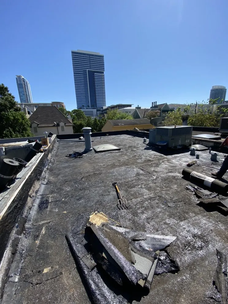 Slide of Quality King Roofing