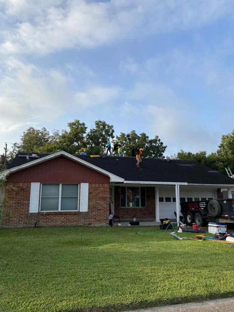 Slide of Quality King Roofing