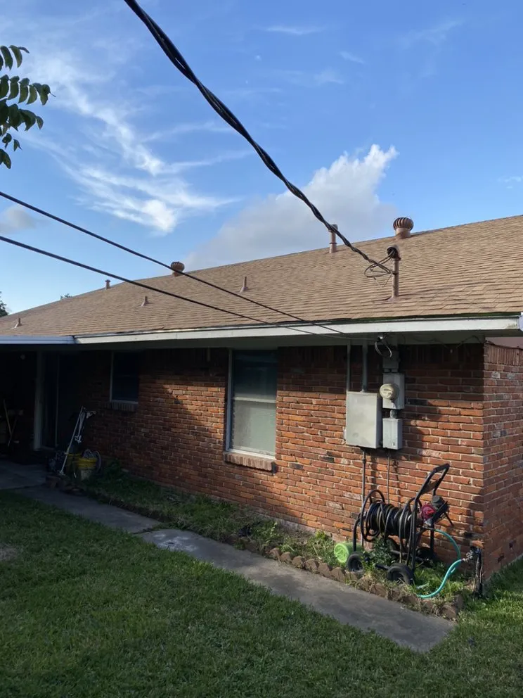 Slide of Quality King Roofing